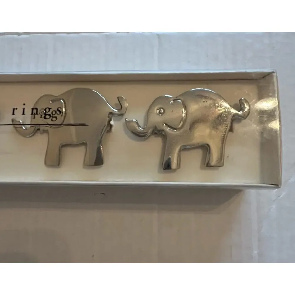 VTG PIER ONE Napkin Rings set of 4 Elephants Nickel Plated Silver Trunk Up Table